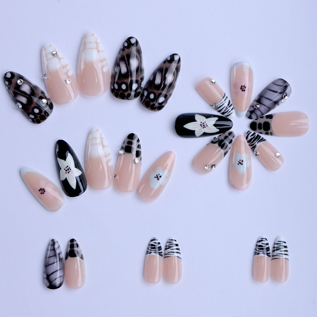 Nail art with elegant designs and embellishments 
Maetiva