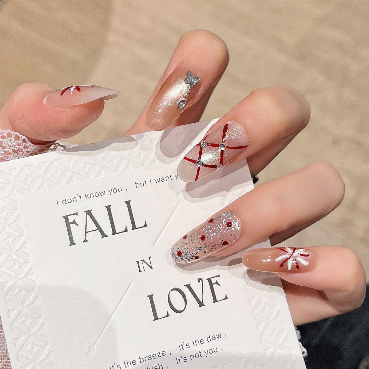 Glamorous Crystal-Studded Stiletto Press-On Nails 
Maetiva