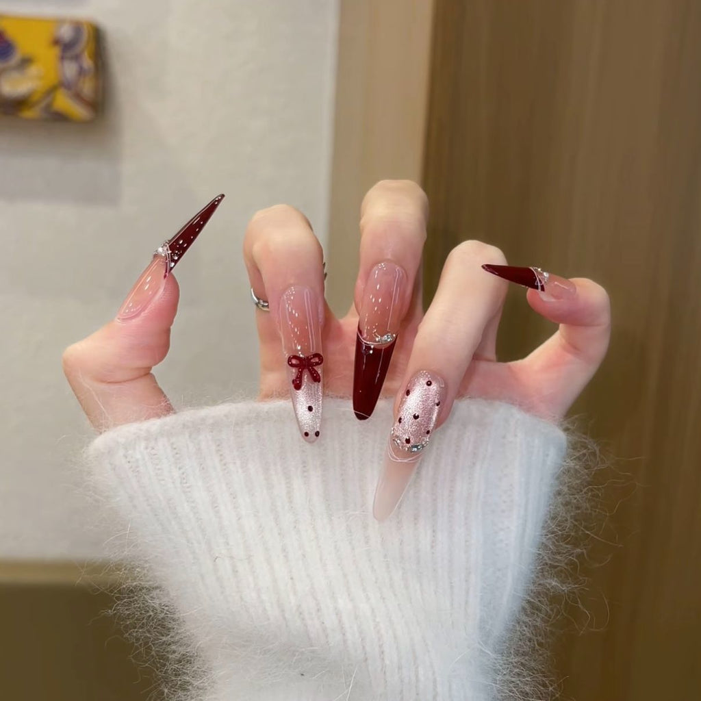 Glamorous Crystal-Studded Stiletto Press-On Nails 
Maetiva