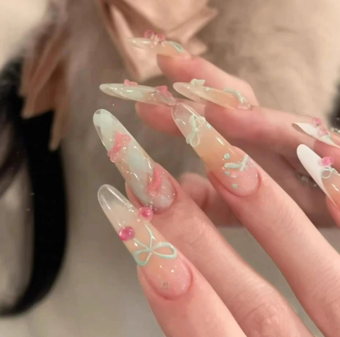 Ombre Stiletto Press-On Nail Art with Gem Accents 
Maetiva