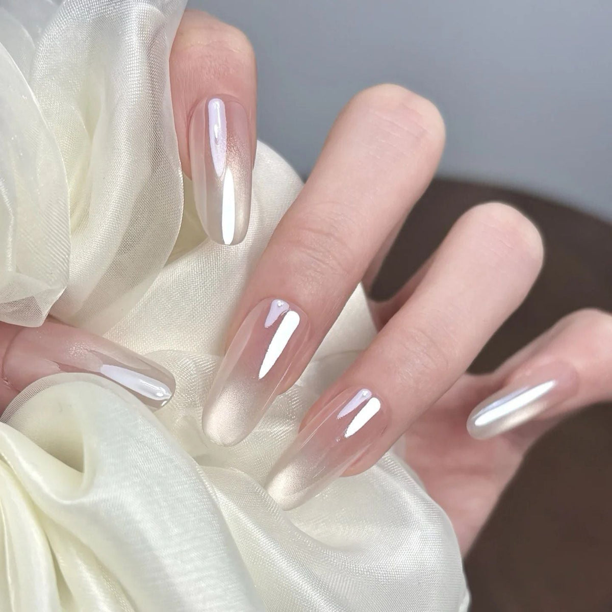 Artistic Nail Design with Decorative Elements 
Maetiva
