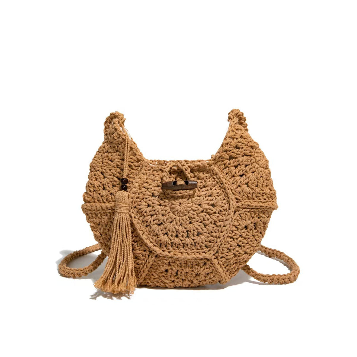Hand-knotted shoulder bag with tassels 
Maetiva