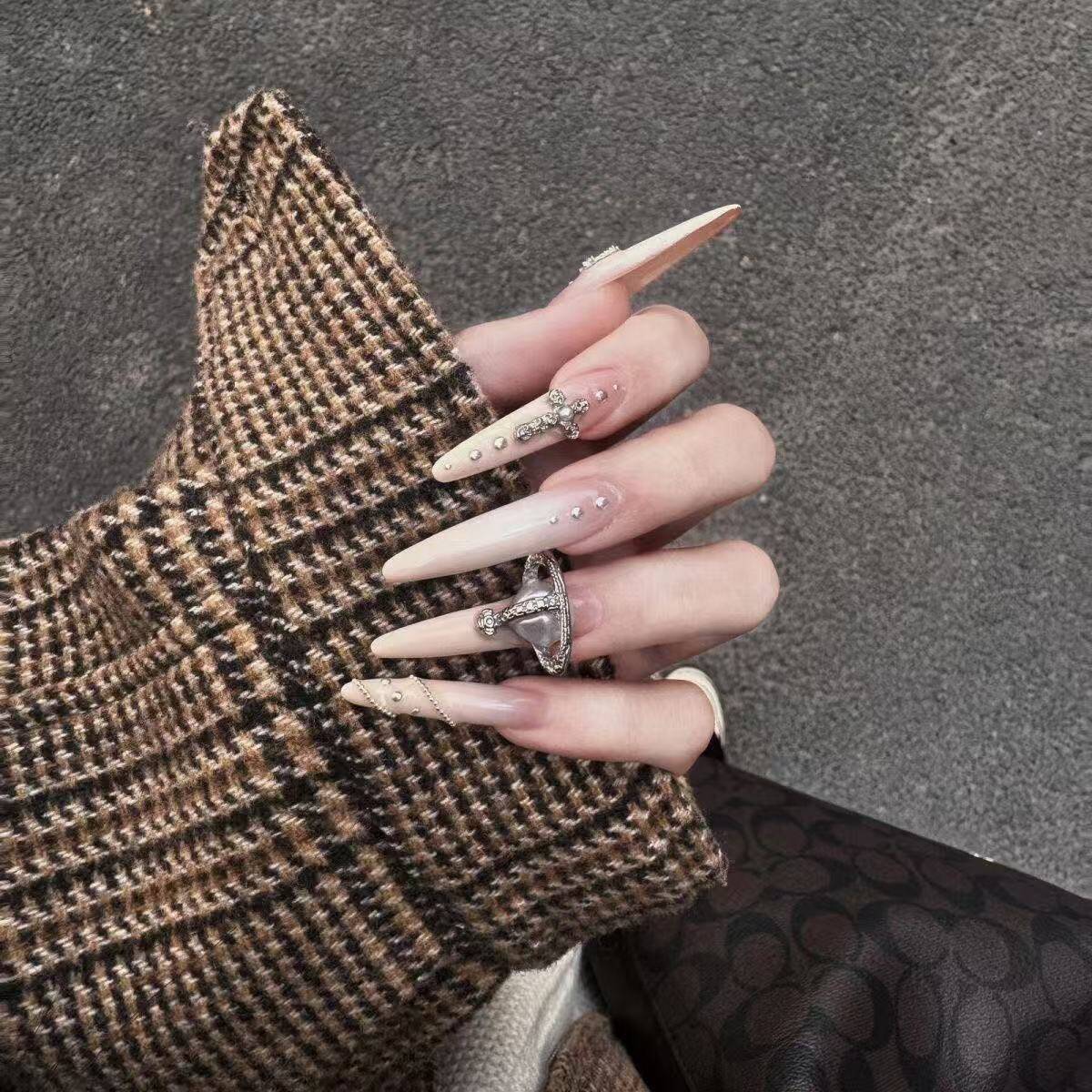 Glamorous Crystal-Studded Stiletto Press-On Nails 
Maetiva