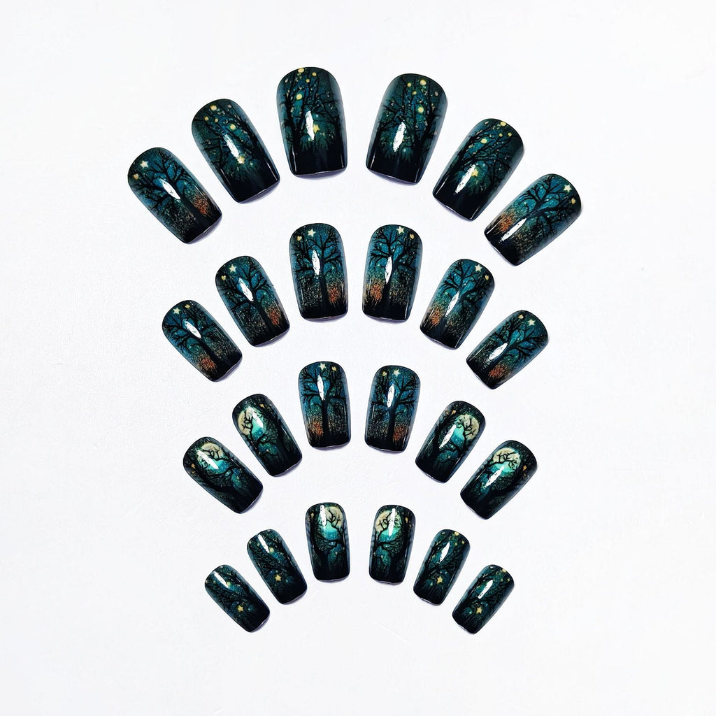 Creative Acrylic Nails with Midnight Forest Design 
Maetiva