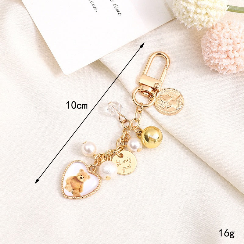 Playful keychain with teddy bear motif 
Maetiva