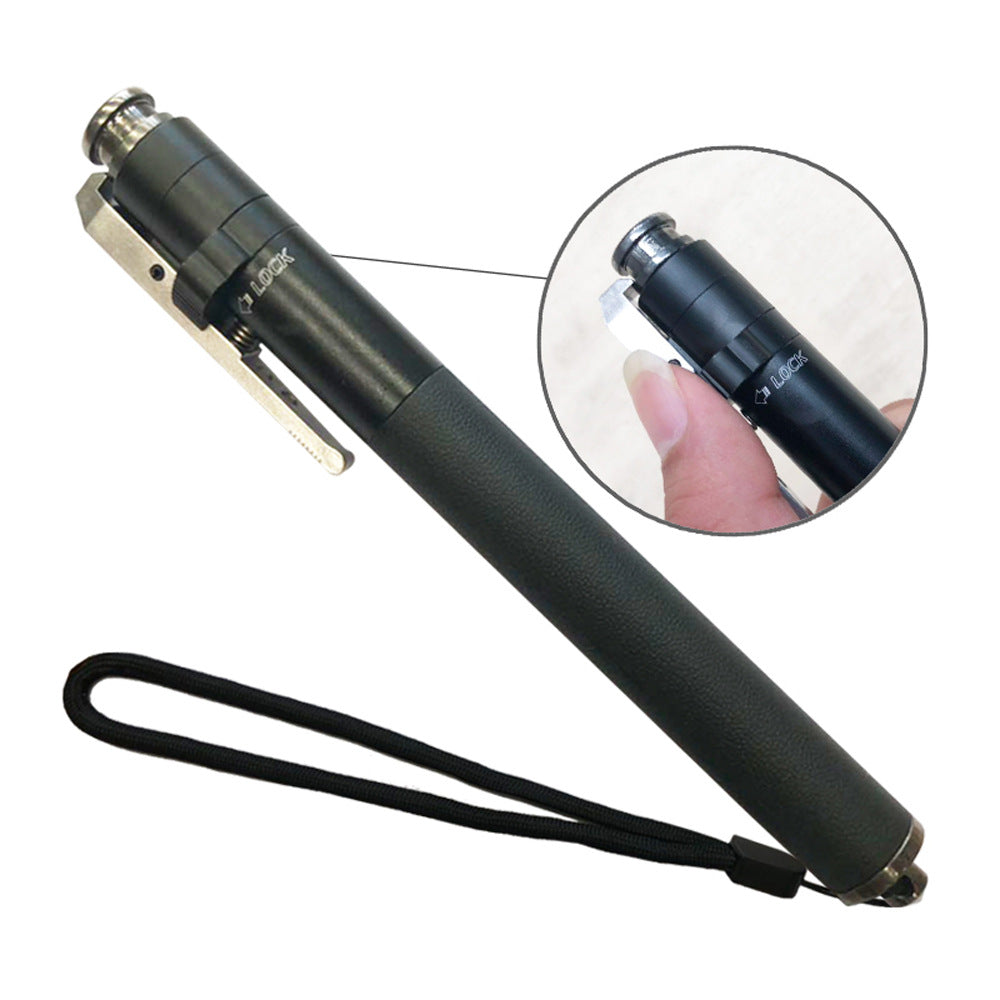 Textured handle and wrist strap on the compact telescoping stick